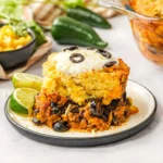 Cornbread casserole with taco beef, cheese, and jalapeños