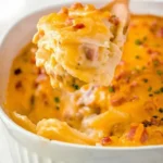 Turkey ham and potato casserole with creamy cheese sauce