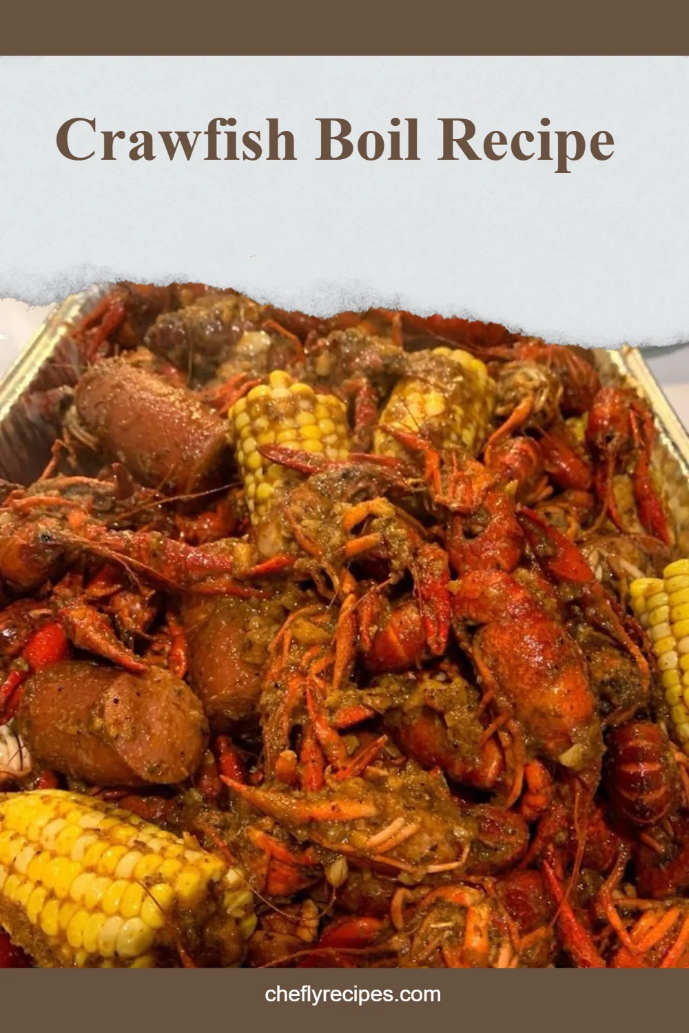 A flavorful crawfish boil presented on a table with seasoning and vegetables.